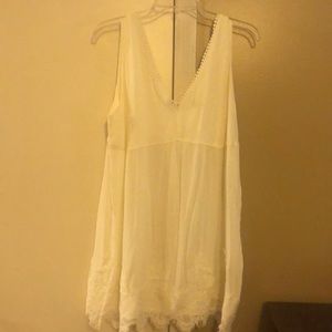 Cream sleeveless tank with lace detail, size L